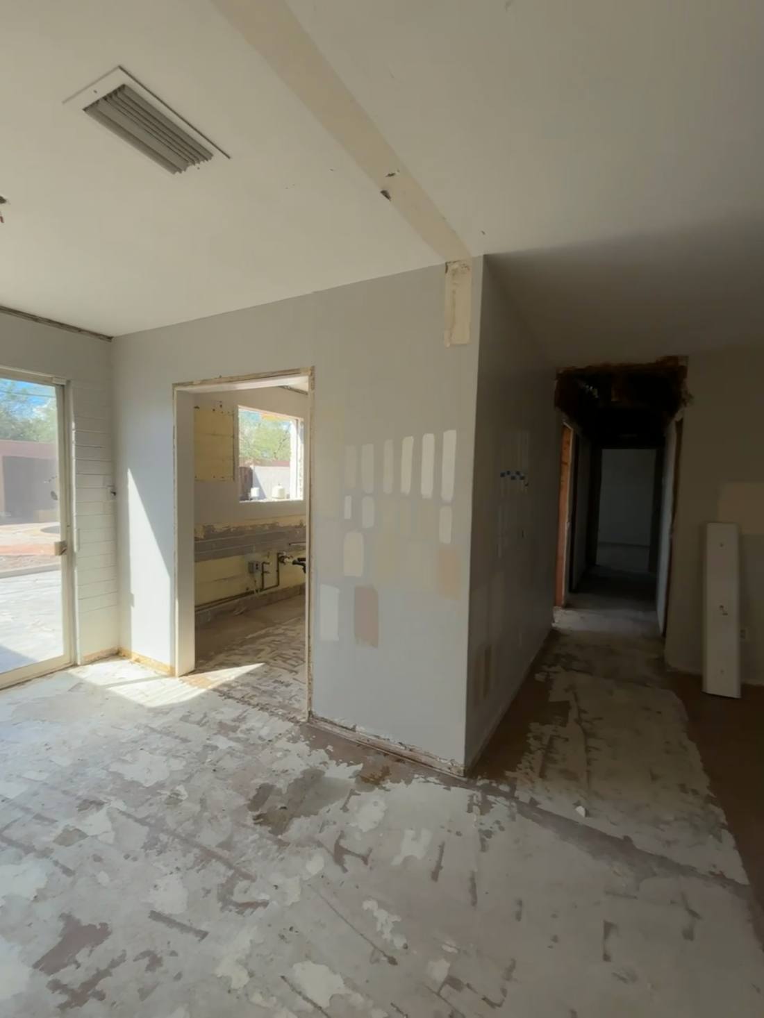 Kitchen and hallway demolition in progress
